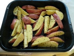 Baked potato wedges before cooking