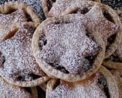 Homemade mince pies dusted with icing sugar