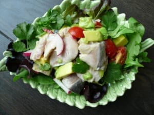 Lime cooked herring mixed with avocado, cherry tomato, radish and herbs