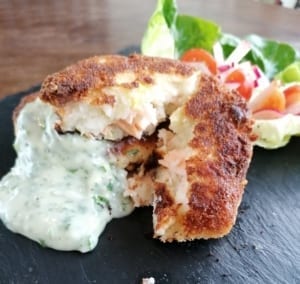 Salmon and smoked haddock fish cakes served with parsley sauce