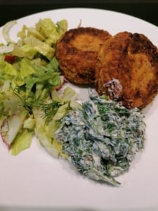 Two nut rissoles served with spinach raita and salad