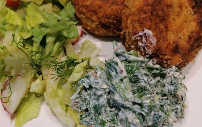 Two nut rissoles served with spinach raita and salad