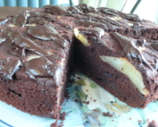 Chocolate cake baked with pear halves