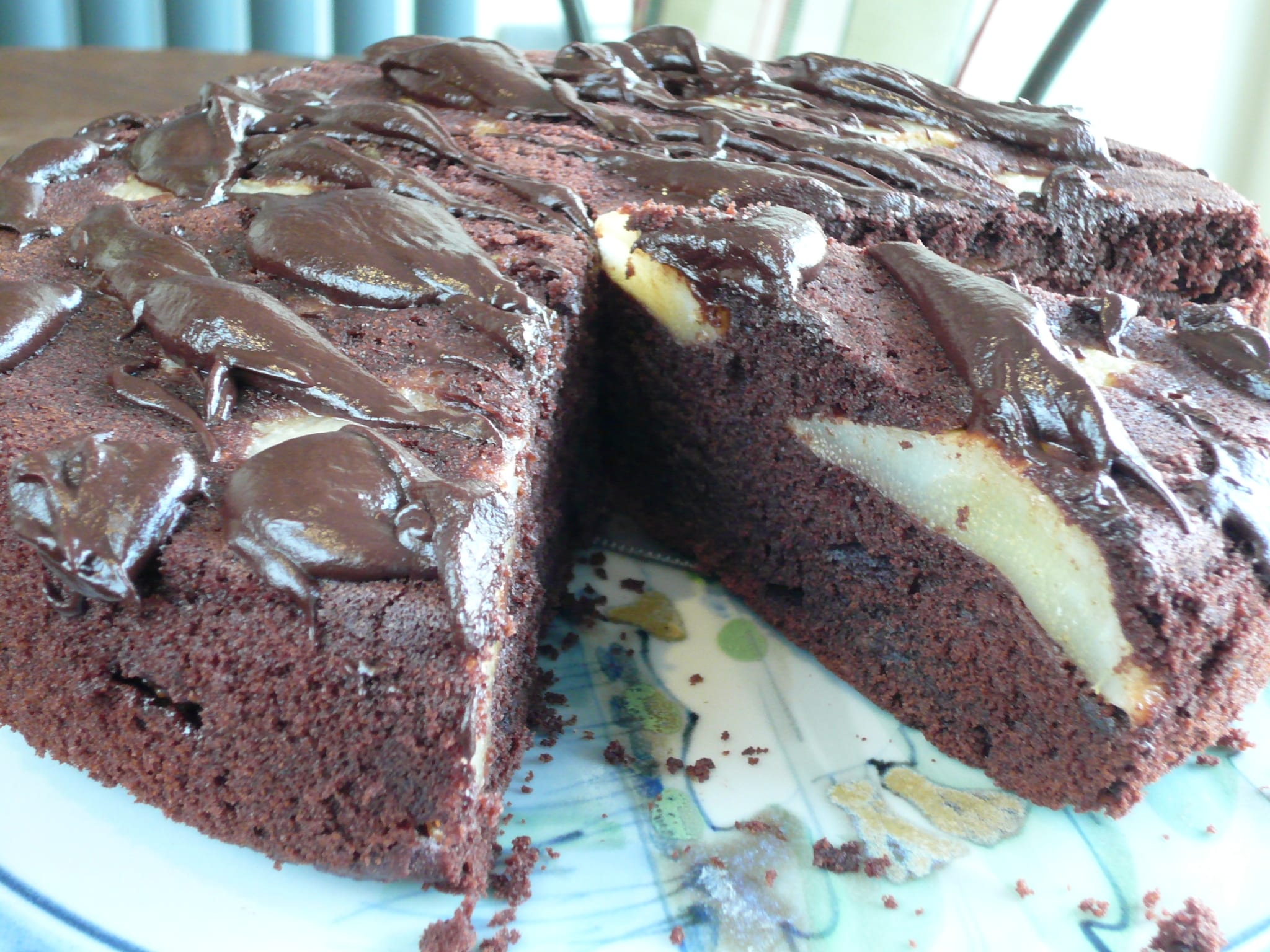 Chocolate cake baked with pear halves