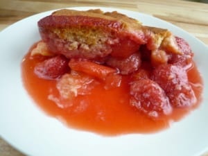 Orange infused stewed apples and strawberries topped with orange flavoured sponge