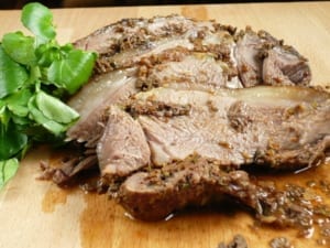 Sliced slow cooked leg of lamb