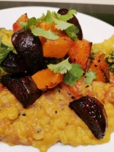 coconut dhal topped with roasted vegetables