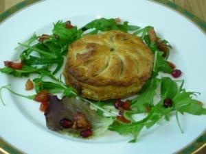 Wild Mushroom Pithivier on a bed of leaves