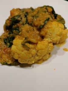 A dish of tandoori cauliflower with red lentil dal