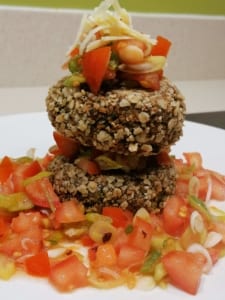 A dish of rocket burgers with tomato salsa