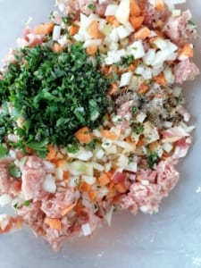 A bowl of chopped pasty ingredients ready to mix