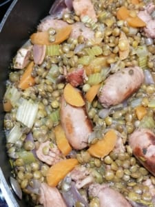 An image of sausage, lentil and bacon casserole