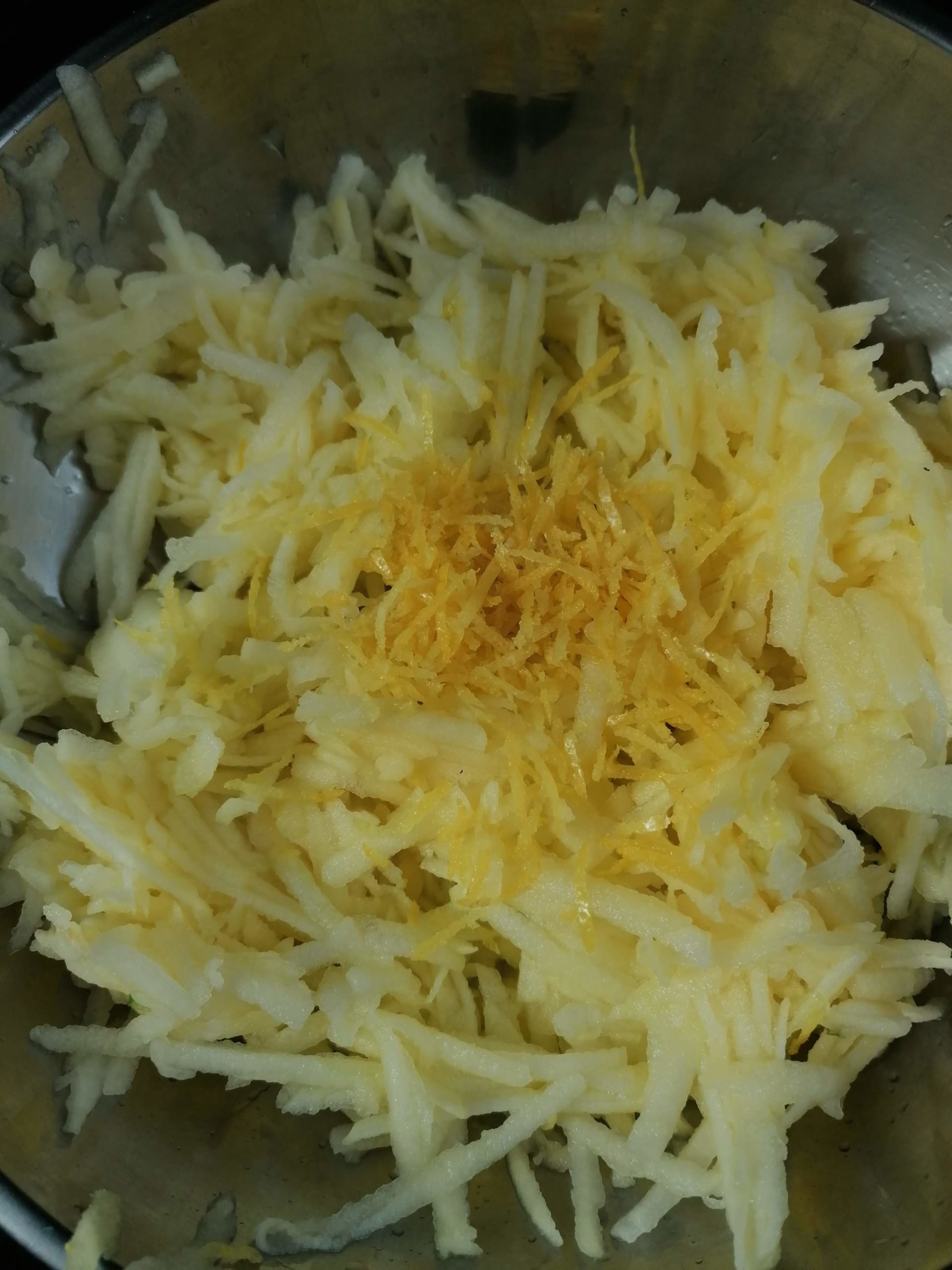 Grated apple, lemon zest & juice ready to be mixed