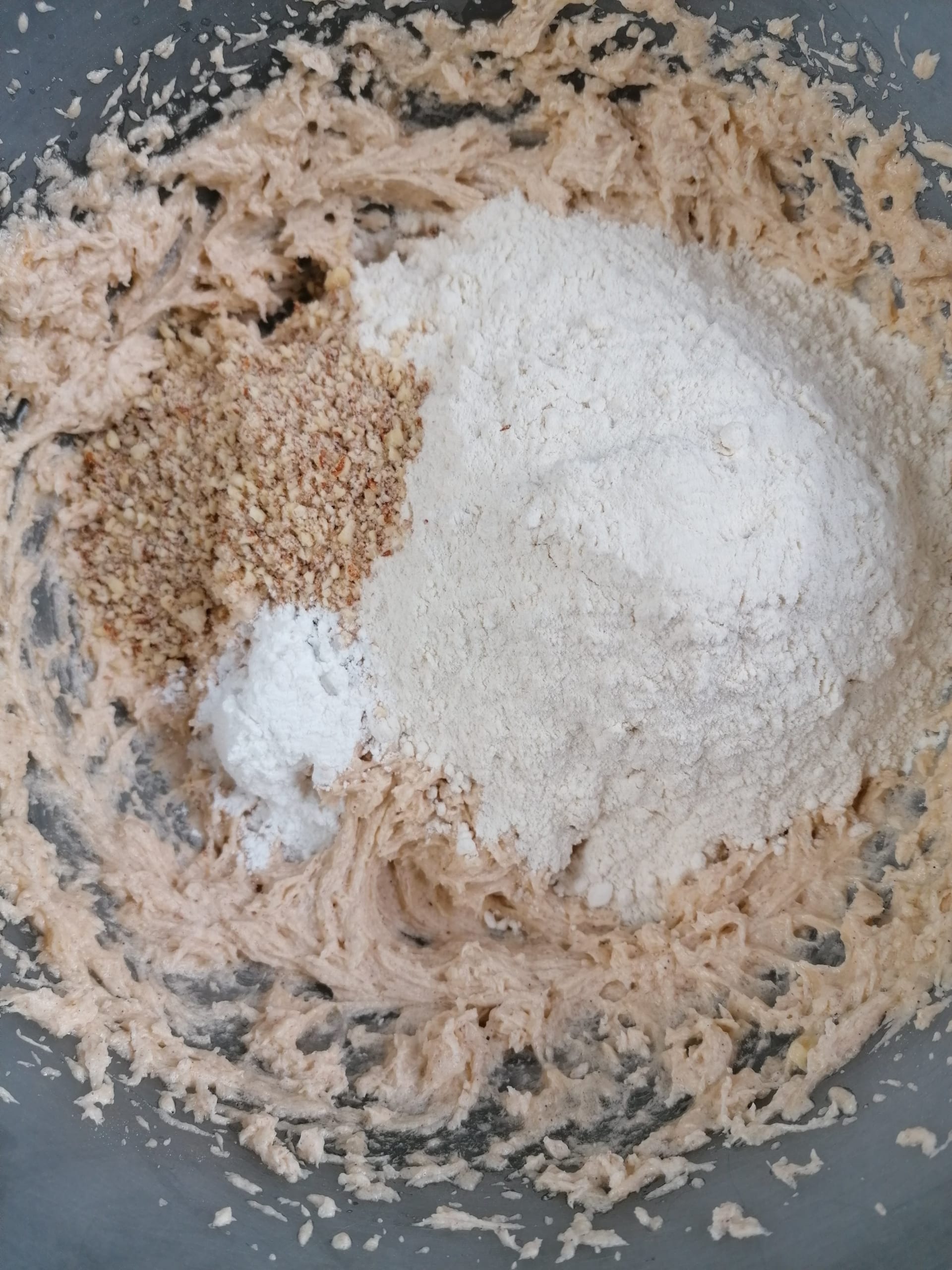 Creamed cake mix with flour & ground almonds ready to be stirred together