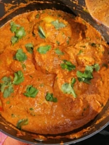 An image of a pan of butterless butter chicken