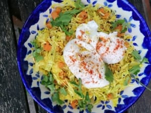 A bowl of Kerelan spiced vegetables with poached eggs