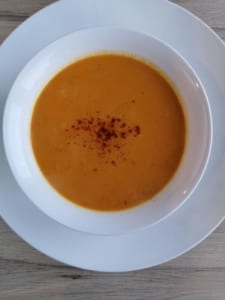 A bowl of spring sweet potato & ginger soup
