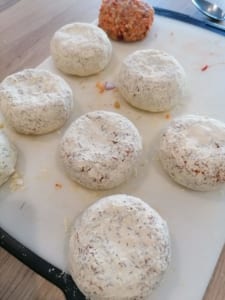 An image of floured nut rissoles ready for frying