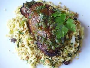 An image of honey spiced lamb steak on a bed of cauliflower rice