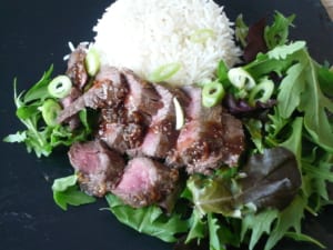an image of teriyaki steak with greens & rice