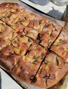 an image of stuffed focaccia, cut into 12 pieces