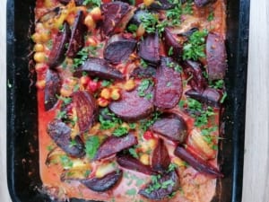 An image of a pan of beetroot, chickpea and coconut curry