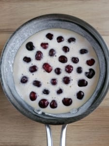 An image of black cherry clafoutis ready for the oven