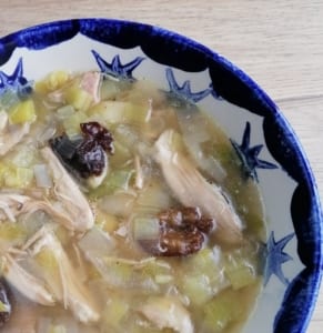 An image of a bowl of cock a leekie soup