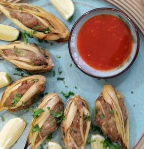 an image of vietnamese lemongrass skewers with chilli dipping sauce