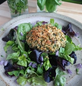 An image of a mushroom stuffed with roasted hazelnuts & herbs