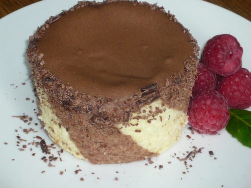 an image of a chocolate bavarois encased in striped sponge